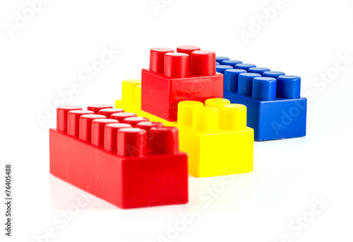 Colorful plastic toy blocks close-yp