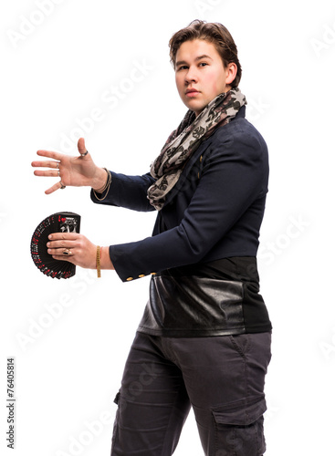 Canvas Print Magician showing trick with playing cards