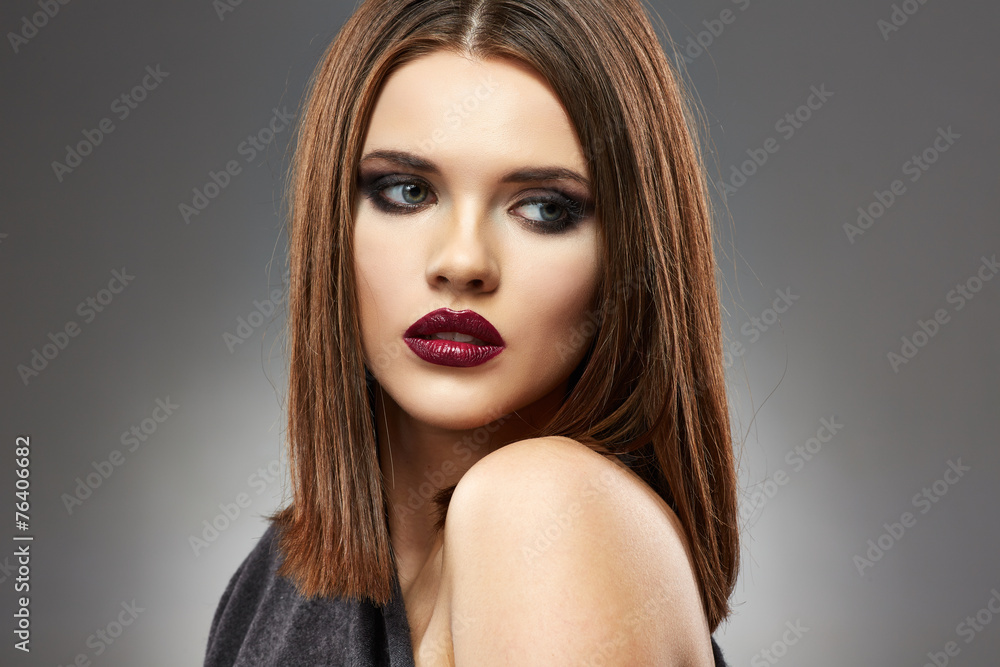 Fototapeta premium Close up beautiful woman face portrait. Sensual model with stra