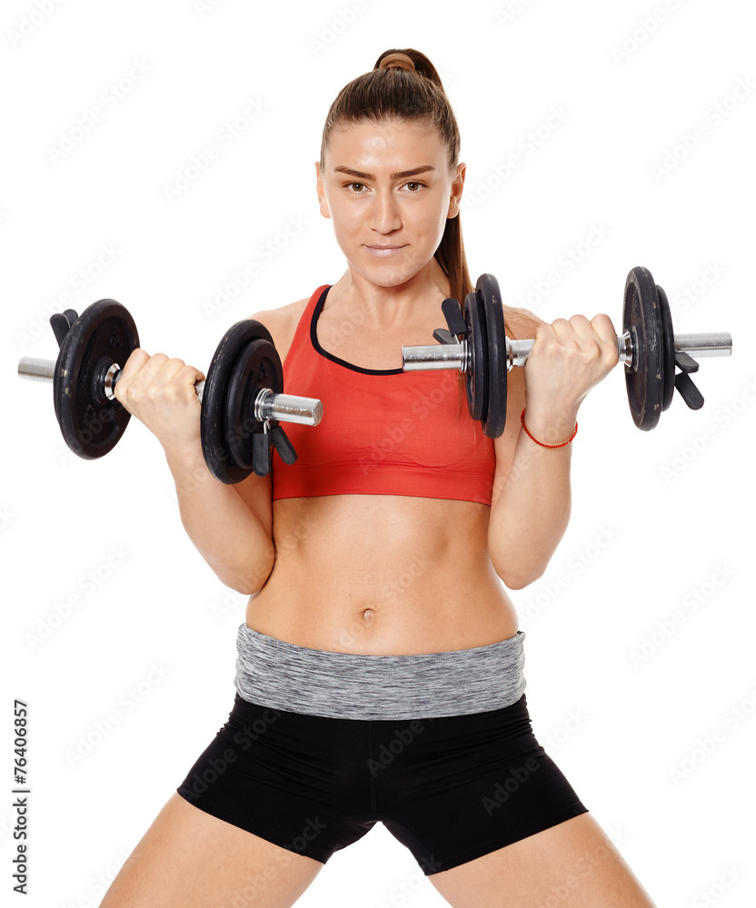 Obraz premium Fitness girl working with weights
