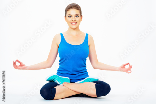 young woman in yoga lotus pose