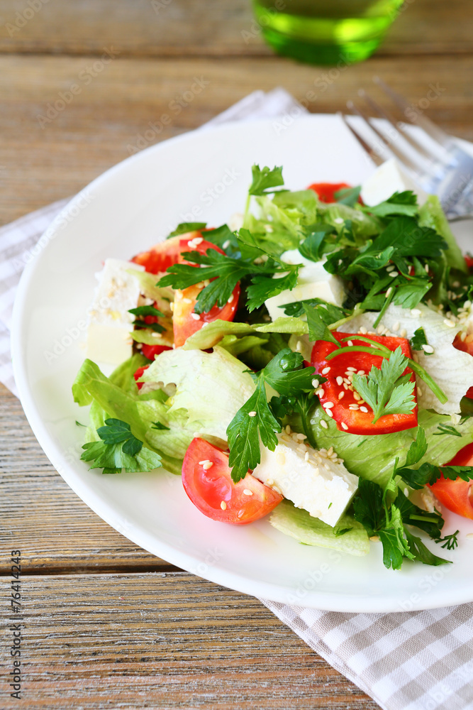 Delicious salad with tomatoes, peppers and cheese