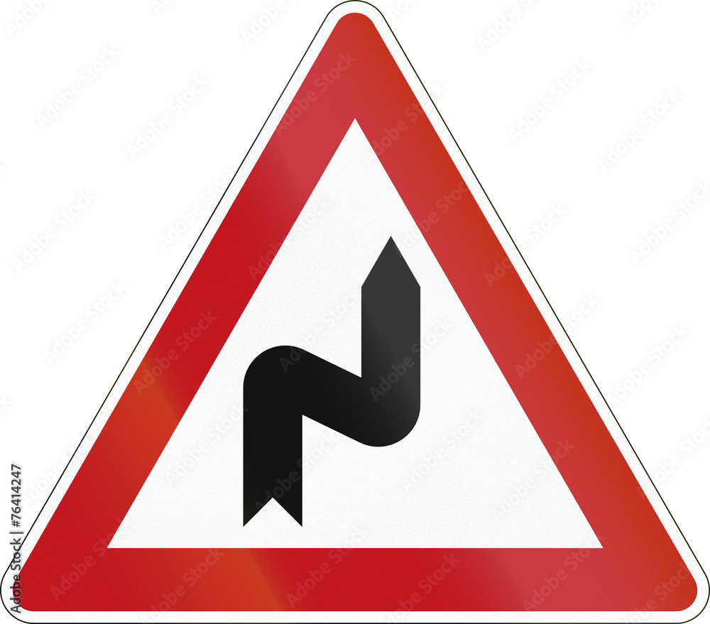 German sign warning about a double curve first to right German sign warning about a double curve first to right