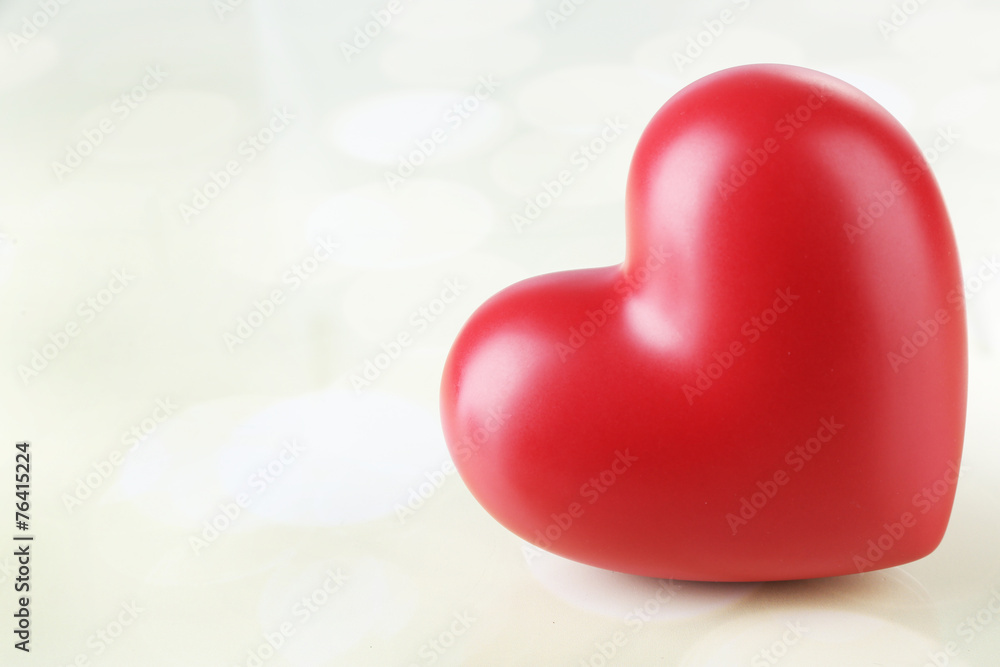 Red heart on light background Red heart on light background