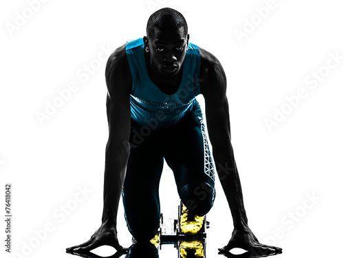 man runner sprinter on starting blocks silhouette