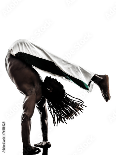  black man dancer dancing capoeira  silhouette #76418429