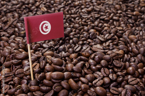 Flag of Tunisia sticking in coffee beans. series 