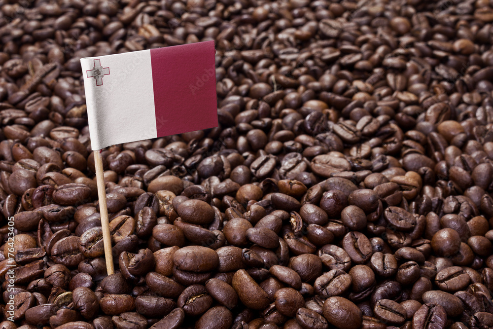 Flag of Malta sticking in coffee beans.(series) Flag of Malta sticking in coffee beans.(series)