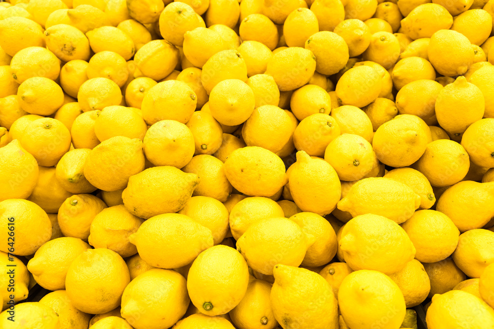 Colorful Display Of Lemons In Fruit Market