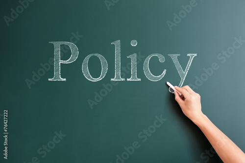 policy written on blackboard