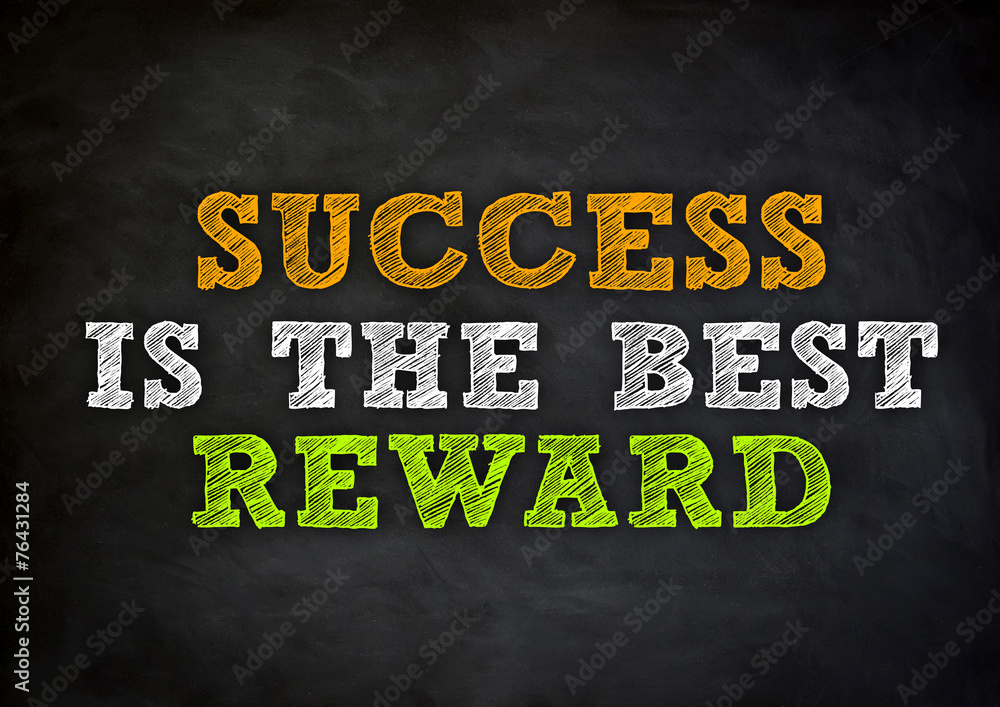 SUCCESS IS THE BEST REWARD written concept SUCCESS IS THE BEST REWARD written concept