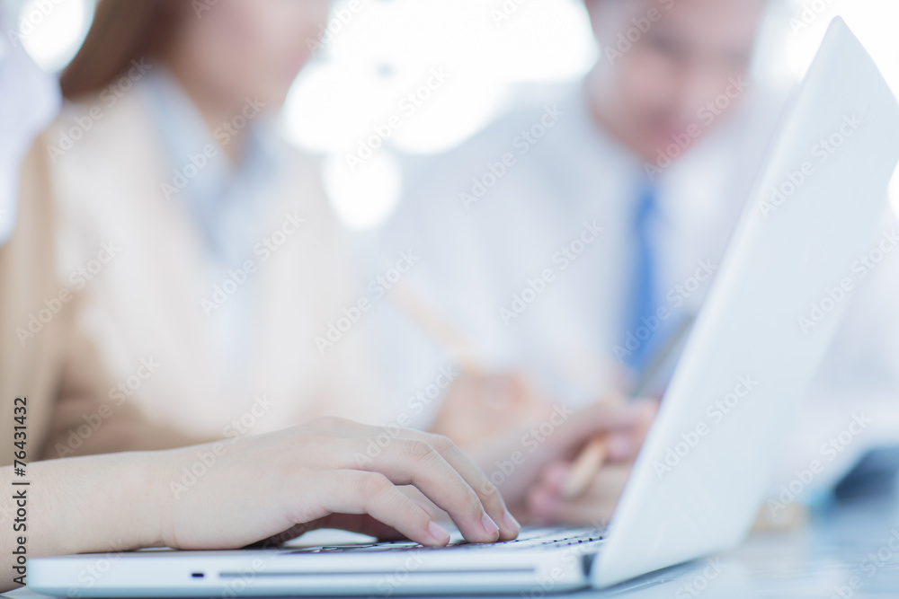 Business people discussing the charts and graphs showing the res Business people discussing the charts and graphs showing the res