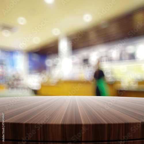Wallpaper Mural Empty wooden round table and blurred background for product pres Torontodigital.ca