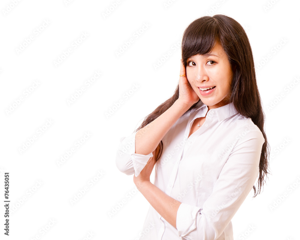 Asian woman with hand on face