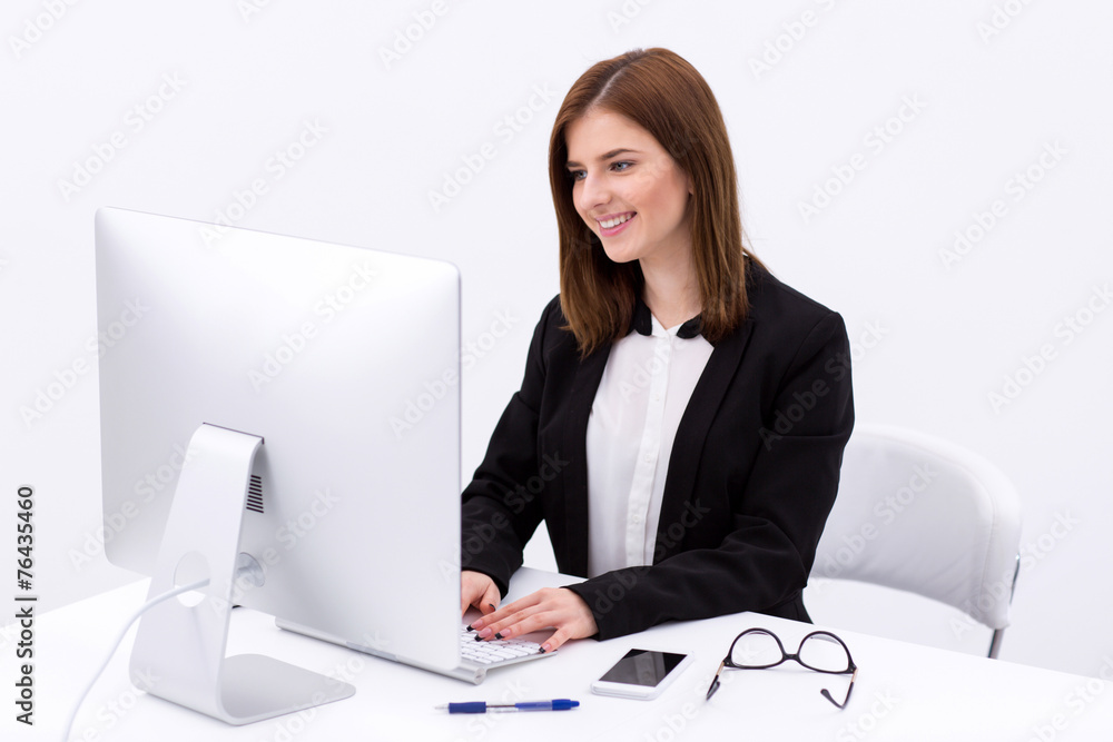Portrait of a happy businesswoman working in the office Portrait of a happy businesswoman working in the office