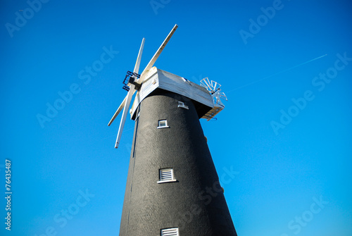 Traditional black brick windmill