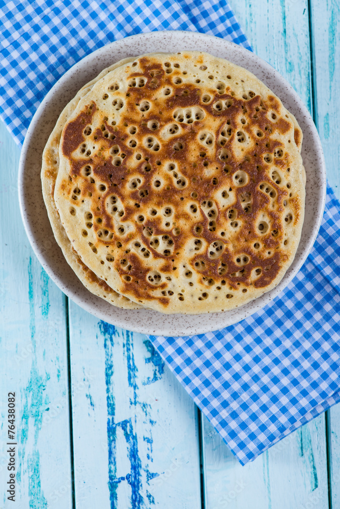 pancakes on rustic wooden table pancakes on rustic wooden table