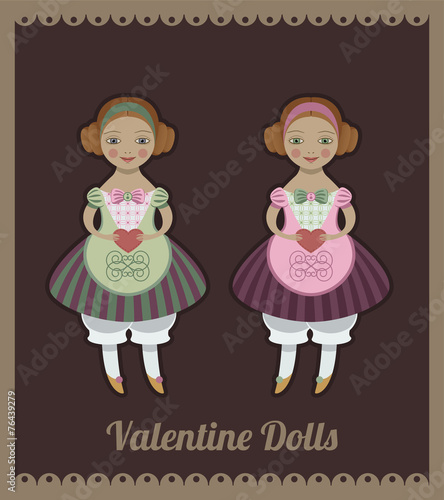 vintage dolls holding heart