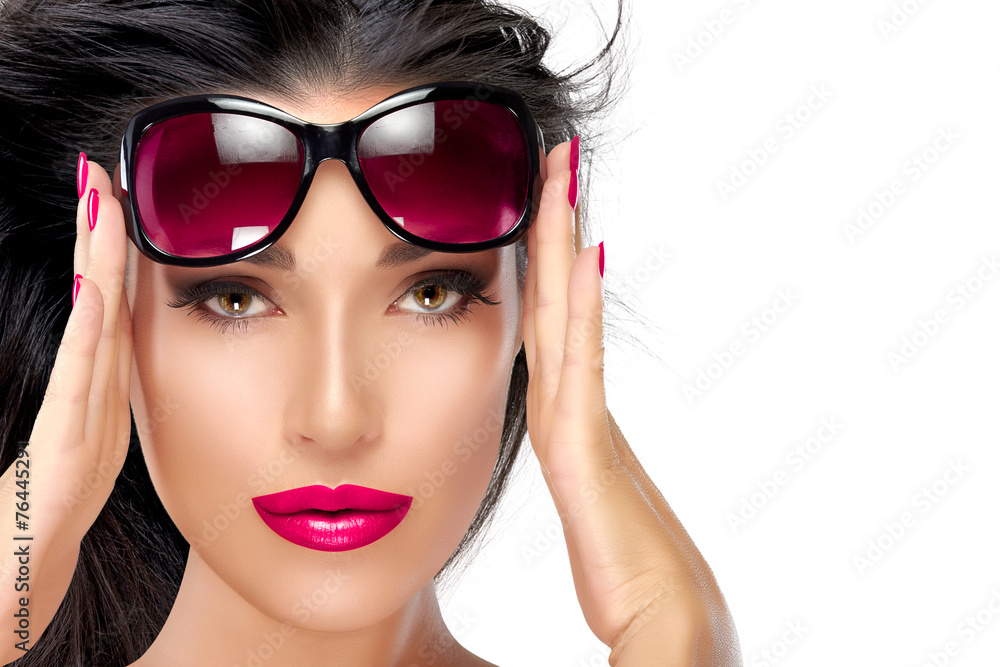 Beautiful Model Holding Fashion Sunglasses on Forehead Beautiful Model Holding Fashion Sunglasses on Forehead