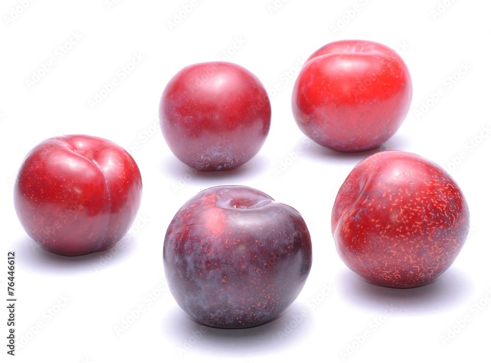 Ripe plums fruit isolated on white background Ripe plums fruit isolated on white background
