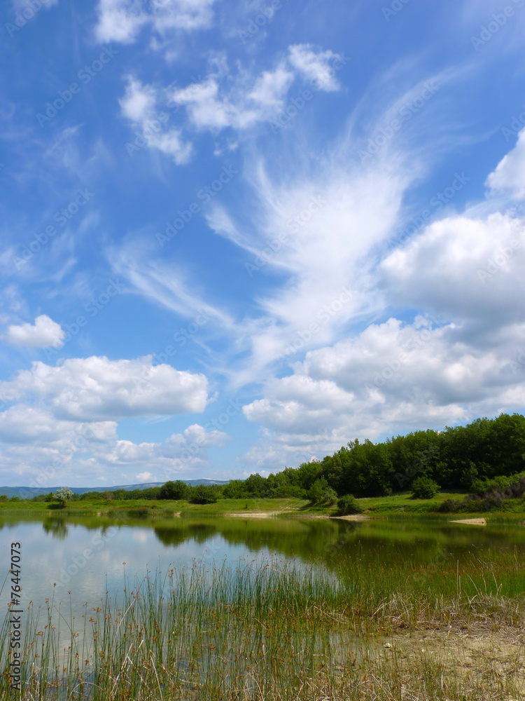 Fototapeta premium Day landscape with different clouds in the blue sky