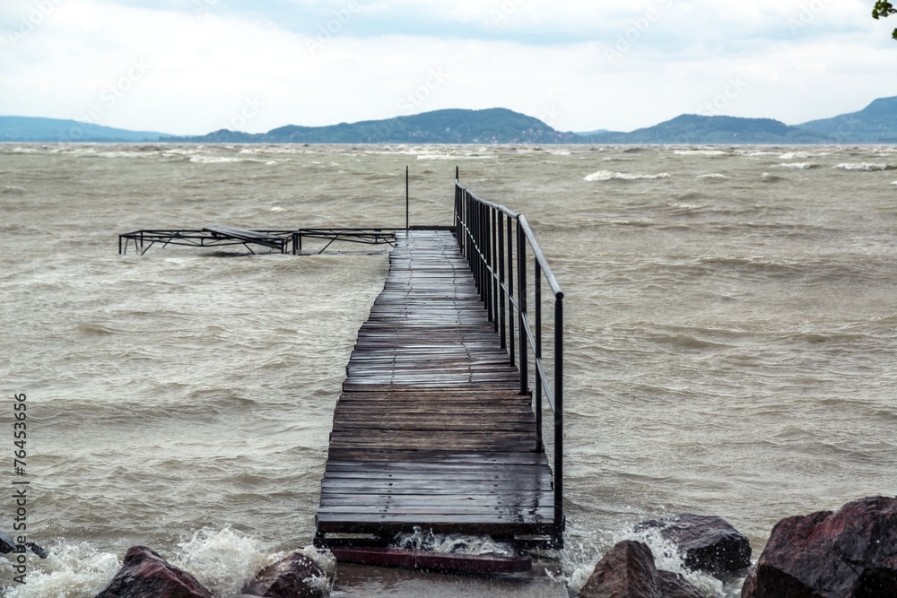 Naklejka premium Storm over the lake