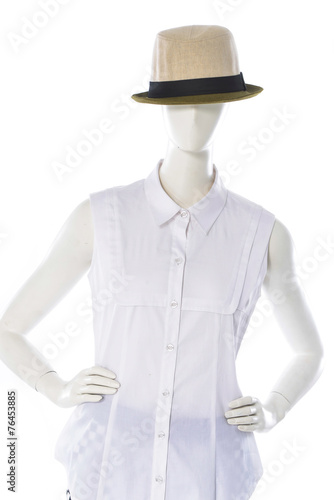 female white shirt clothing in straw hat on mannequin