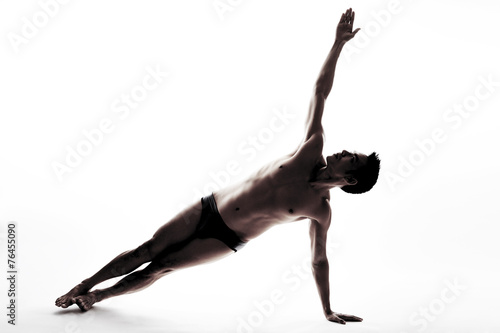 Man body silhouette in yoga post