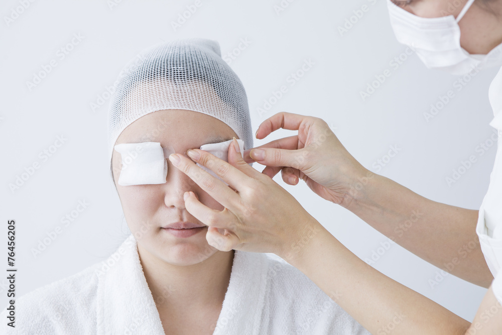 Woman wearing a gauze to eye Stock Photo Adobe Stock