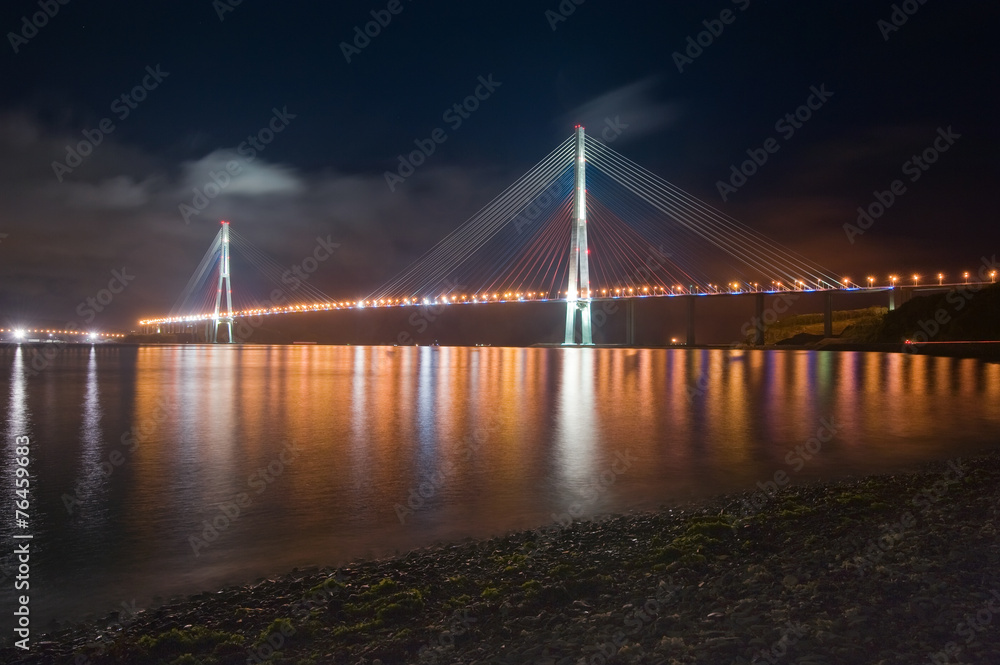Night view of the bridge on the Russian island. Vladivostok.