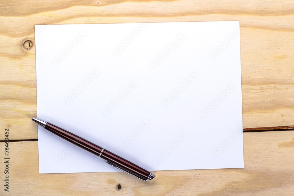 pen over white paper page pen over white paper page