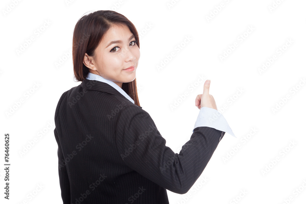 Young Asian businesswoman turn back thumbs up Young Asian businesswoman turn back thumbs up