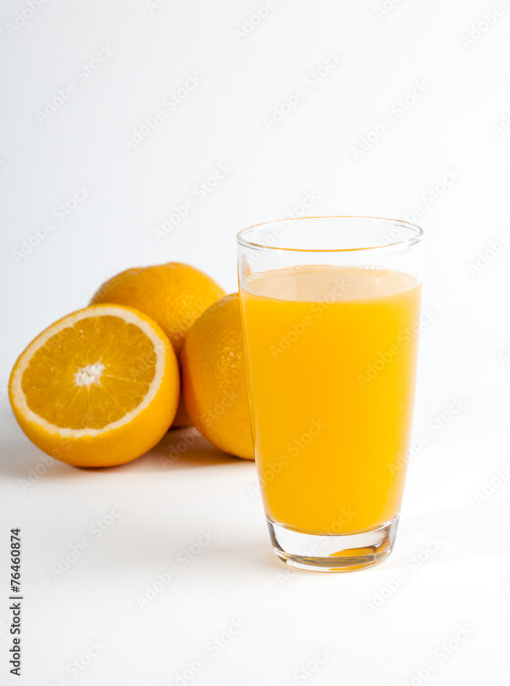 Sliced orange and a glass of orange juice Sliced orange and a glass of orange juice