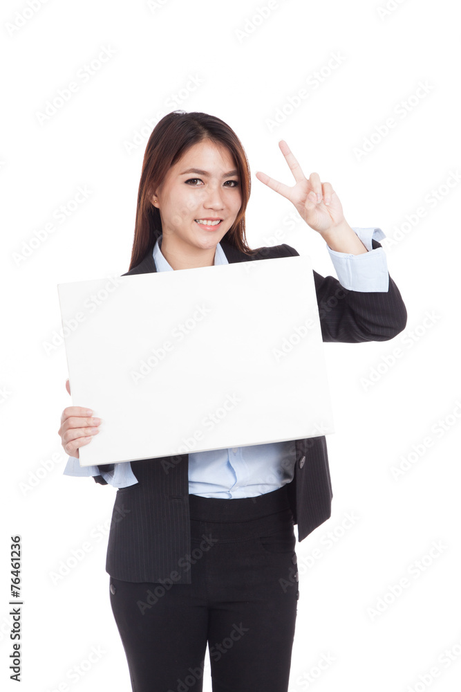 Young Asian businesswoman show victory sign and blank sign Young Asian businesswoman show victory sign and blank sign