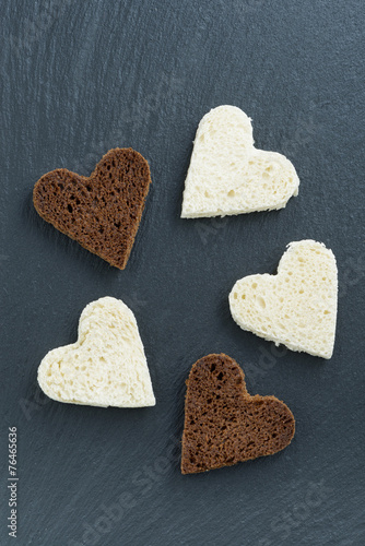 Wallpaper Mural toasted rye and white bread in the form of heart on black Torontodigital.ca
