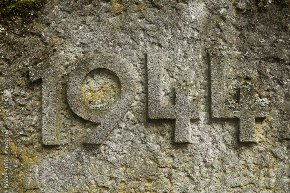 Year 1944 carved in the stone. The years of World War II. - obrazy, fototapety, plakaty 