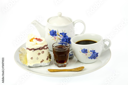 cup of coffee and delicious cake