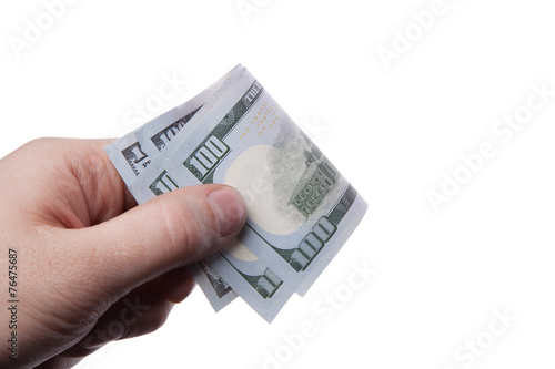 male hand holding hundred dollar banknotes on white background