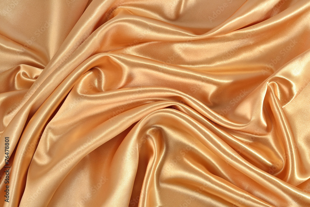 Fototapeta premium Background from golden satin fabric