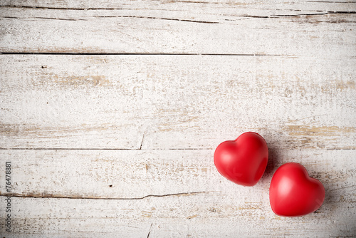 couple of hearts on wood photo