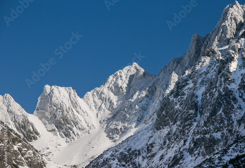 Breathtaking view of snowy mountains in the Tatra mountains © pmartike