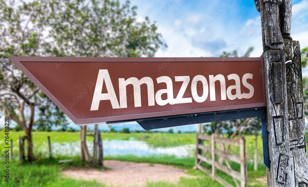 Fototapeta premium Amazonas wooden sign with rural background