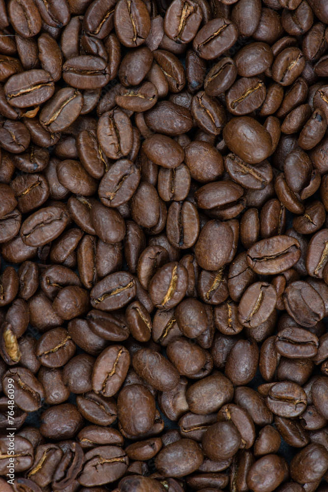 close view on roasted coffee beans close view on roasted coffee beans