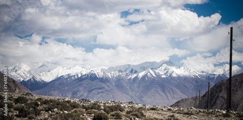 Mountains and clouds on Pamir. Spring. Tajikistan. Toned