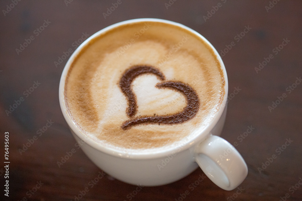 Coffee cup with milk and heart shape Coffee cup with milk and heart shape
