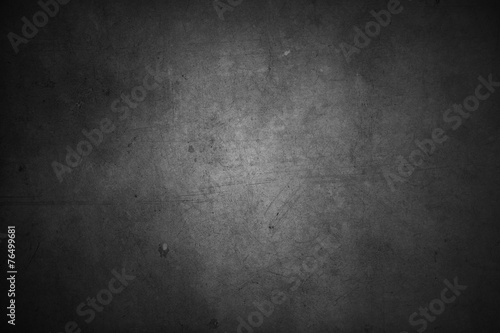 Grey concrete wall texture background. Dark edges