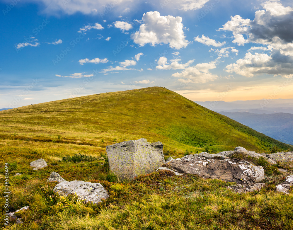 white boulders on the hillside at sunrise