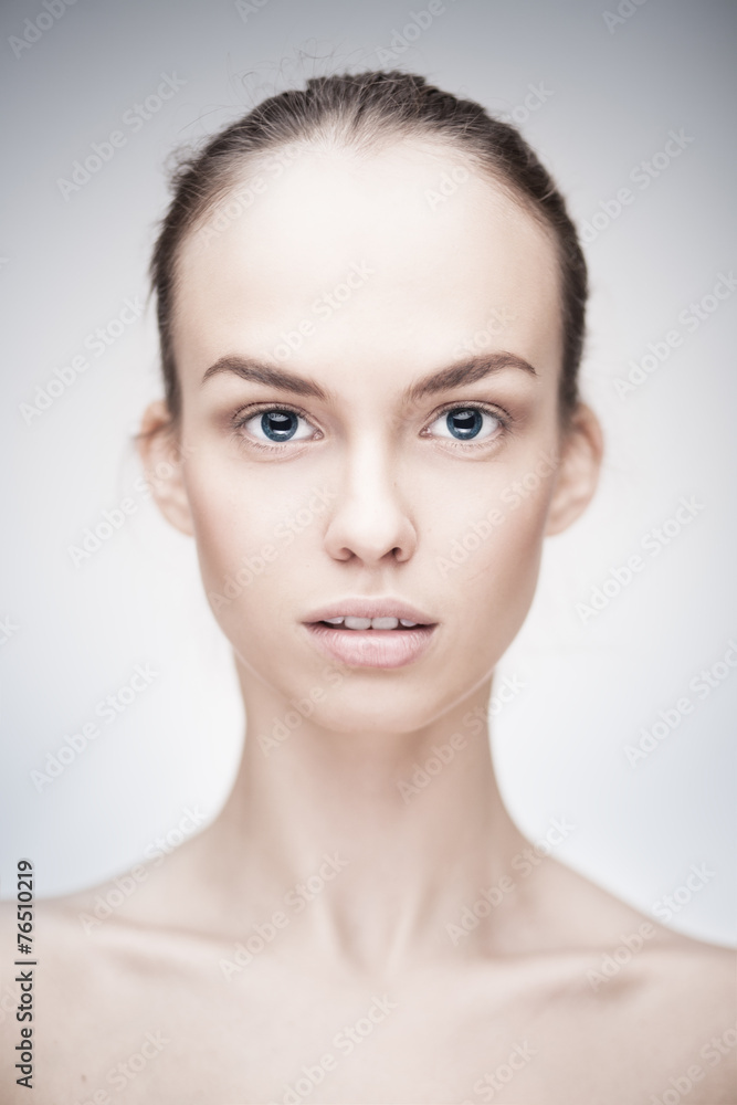 portrait of a beautiful woman with clean face skin