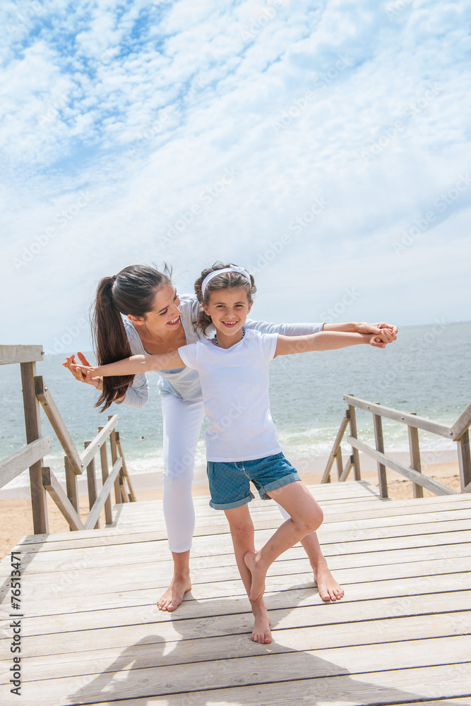 nice moments for a mother and her daugther at seaside nice moments for a mother and her daugther at seaside