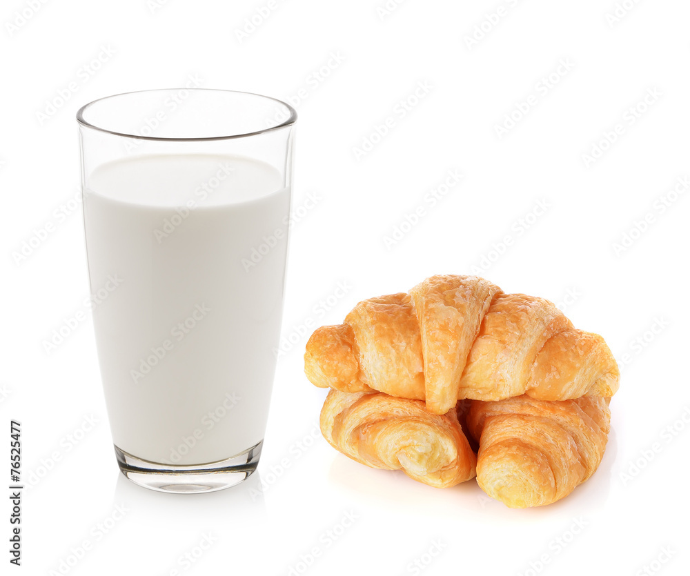 Glass of milk and croissants isolated on white Glass of milk and croissants isolated on white